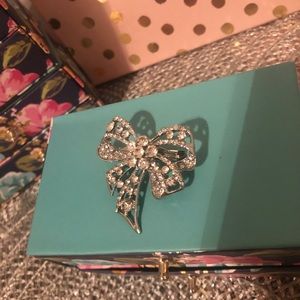 Silver bow tie brooch pin